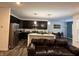 Modern kitchen with island, stainless steel appliances, and dark cabinets at 2746 Lanai Ln, Greenwood, IN 46143