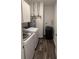 Laundry room with washer, dryer, and overhead cabinets at 2746 Lanai Ln, Greenwood, IN 46143