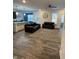 Spacious living room with dark leather sofas and a ceiling fan at 2746 Lanai Ln, Greenwood, IN 46143