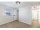 Bedroom with hardwood floors and access to hallway at 305 Hamilton St, Fortville, IN 46040