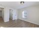 Bright and airy bedroom with hardwood floors and access to a closet and hallway at 305 Hamilton St, Fortville, IN 46040