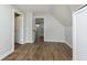 Cozy room features wood-look flooring and two doorways; closet to the right side at 3102 N Arsenal Ave, Indianapolis, IN 46218