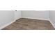 Cozy bedroom featuring new wood-look floors, fresh paint, and natural light at 3102 N Arsenal Ave, Indianapolis, IN 46218
