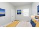 Inviting bedroom with a comfortable bed, neutral decor, and ample natural light for a relaxing space at 3102 N Arsenal Ave, Indianapolis, IN 46218