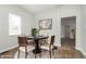 Cozy dining room featuring a round table, modern chairs, and a contemporary rug at 3102 N Arsenal Ave, Indianapolis, IN 46218