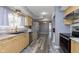 Well-lit kitchen featuring modern appliances and stylish countertops at 5183 Fairway Dr, Avon, IN 46123