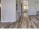 Bright living area with sleek floors leading to the front door at 5183 Fairway Dr, Avon, IN 46123