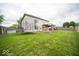 Large backyard with trampoline, firepit and deck at 57 Sebring Ct, Whiteland, IN 46184