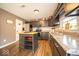 Spacious kitchen featuring dark cabinetry and an island at 57 Sebring Ct, Whiteland, IN 46184