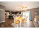 Eat-in kitchen with dark cabinetry and wooden dining table at 57 Sebring Ct, Whiteland, IN 46184