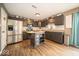 Modern kitchen with stainless steel appliances and an island at 57 Sebring Ct, Whiteland, IN 46184