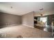 Open concept living and dining area with carpeted floors at 57 Sebring Ct, Whiteland, IN 46184