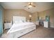 Main bedroom with king-size bed, ensuite, and built-in desk at 57 Sebring Ct, Whiteland, IN 46184