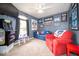 Fun recreation room with a couch and Chicago Cubs decor at 57 Sebring Ct, Whiteland, IN 46184