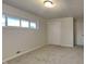 Well-lit bedroom with neutral walls and carpet at 5939 Brendonridge S Ct, Indianapolis, IN 46226