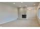 Living room with fireplace and hardwood floors at 5939 Brendonridge S Ct, Indianapolis, IN 46226