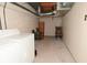 Unfinished basement with laundry hookups and storage space at 6639 N College Ave, Indianapolis, IN 46220