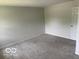 Bedroom featuring neutral carpeting and light colored walls at 6639 N College Ave, Indianapolis, IN 46220