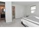Main bedroom with ensuite bathroom and gray carpet at 6639 N College Ave, Indianapolis, IN 46220