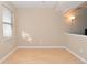 Empty dining room with light walls and hardwood floors at 6639 N College Ave, Indianapolis, IN 46220