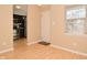 Dining area with view into kitchen and exterior door at 6639 N College Ave, Indianapolis, IN 46220