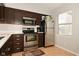 Kitchen with stainless steel appliances and ample cabinet space at 6639 N College Ave, Indianapolis, IN 46220