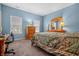 Spacious bedroom with a dresser, and a work desk at 7842 Cork Bend Ln, Indianapolis, IN 46239