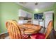 Kitchen and dining area with wood table and chairs at 7842 Cork Bend Ln, Indianapolis, IN 46239