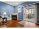 Gas fireplace with corner placement, near patio at 7842 Cork Bend Ln, Indianapolis, IN 46239