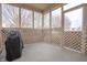 Covered patio with grill and lattice privacy fencing at 7842 Cork Bend Ln, Indianapolis, IN 46239