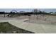 Community playground with various climbing structures and swings at 7842 Cork Bend Ln, Indianapolis, IN 46239