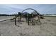 Modern playground equipment with climbing nets and a slide at 7842 Cork Bend Ln, Indianapolis, IN 46239