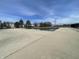 Community pool with ladders for easy access and a concrete deck area at 7842 Cork Bend Ln, Indianapolis, IN 46239