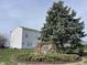 Community welcome sign surrounded by lush greenery and landscaping at 7842 Cork Bend Ln, Indianapolis, IN 46239