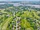 A beautiful golf course community from above, a quiet area with a lake nearby at 956 Dorchester Dr, Noblesville, IN 46062