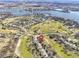 Wide aerial view of property location near golf course and lake at 956 Dorchester Dr, Noblesville, IN 46062