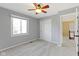 Bright bedroom featuring double closet and access to hallway at 956 Dorchester Dr, Noblesville, IN 46062