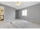 Well-lit bedroom with window and ceiling fan at 956 Dorchester Dr, Noblesville, IN 46062