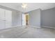 Spacious bedroom with double doors and ceiling fan at 956 Dorchester Dr, Noblesville, IN 46062