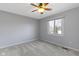 Spacious bedroom with ceiling fan and neutral wall paint at 956 Dorchester Dr, Noblesville, IN 46062