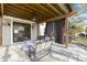 Covered patio with seating area and access to interior at 956 Dorchester Dr, Noblesville, IN 46062