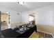 Bright dining room with a table set for four at 956 Dorchester Dr, Noblesville, IN 46062