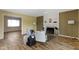 Gathering room featuring a fireplace and two comfortable armchairs at 956 Dorchester Dr, Noblesville, IN 46062