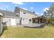 Exterior view of house with backyard patio and shed at 956 Dorchester Dr, Noblesville, IN 46062