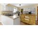 Spacious kitchen with island, stainless steel appliances, and hardwood floors at 956 Dorchester Dr, Noblesville, IN 46062