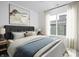Spacious bedroom with large window and neutral color palette at 9893 Greenvine Dr, Carmel, IN 46032