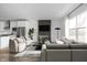 Open living space with modern furniture and fireplace at 9893 Greenvine Dr, Carmel, IN 46032