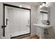Elegant bathroom with a walk-in shower with white subway tile at 10841 W Grandview Dr, Columbus, IN 47201