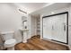 Modern bathroom featuring a sleek sink and glass-enclosed shower at 10841 W Grandview Dr, Columbus, IN 47201