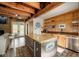 Kitchen featuring wood cabinets and a stainless steel island at 10841 W Grandview Dr, Columbus, IN 47201